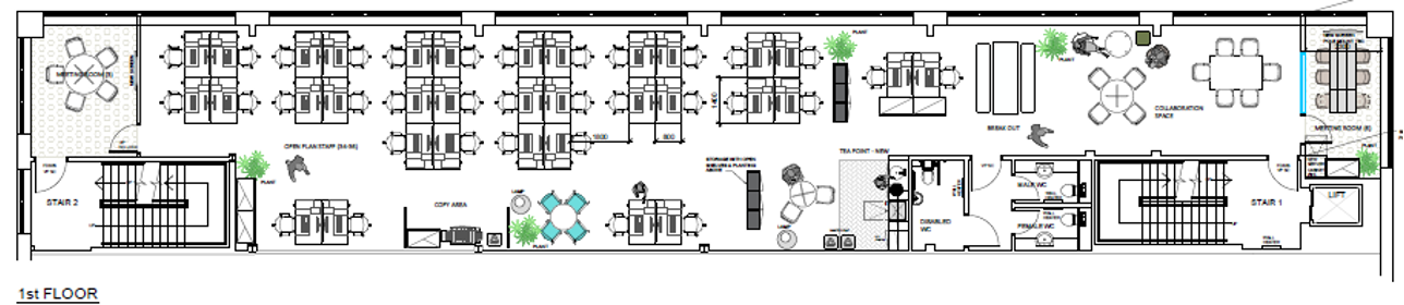 Floor plan section showing multiple rows of paired workstations with desks arranged back-to-back, alongside a central walkway and small breakout seating area.
